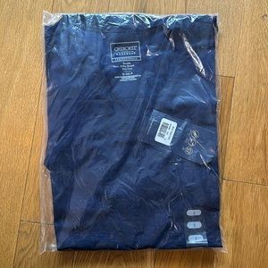 New unopened navy blue scrub top! Perfect condition. Durable, 2 way stretch.